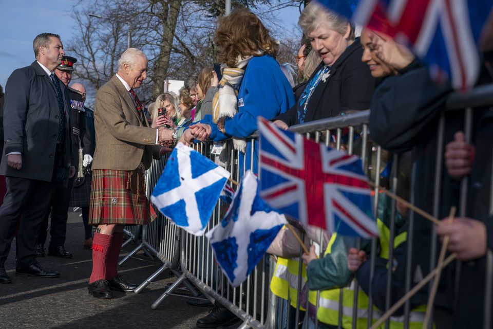 Charles took the time to shake hands with many of those gathered outside The Gate for his visit (Jane Barlow/PA)