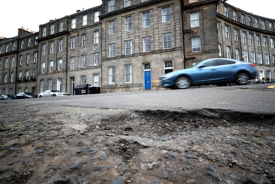 The increase in funding is estimated to be enough to around seven million potholes (Jane Barlow/PA)