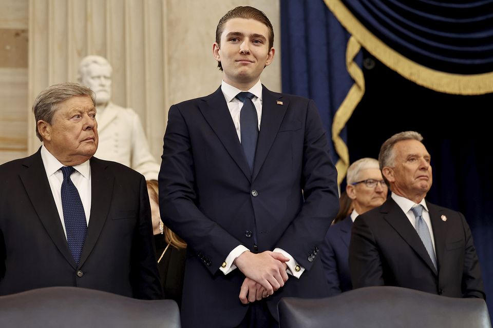 Barron Trump arrives before the 60th Presidential Inauguration in the Rotunda of the US Capitol in Washington (Chip Somodevilla/Pool Photo via AP)