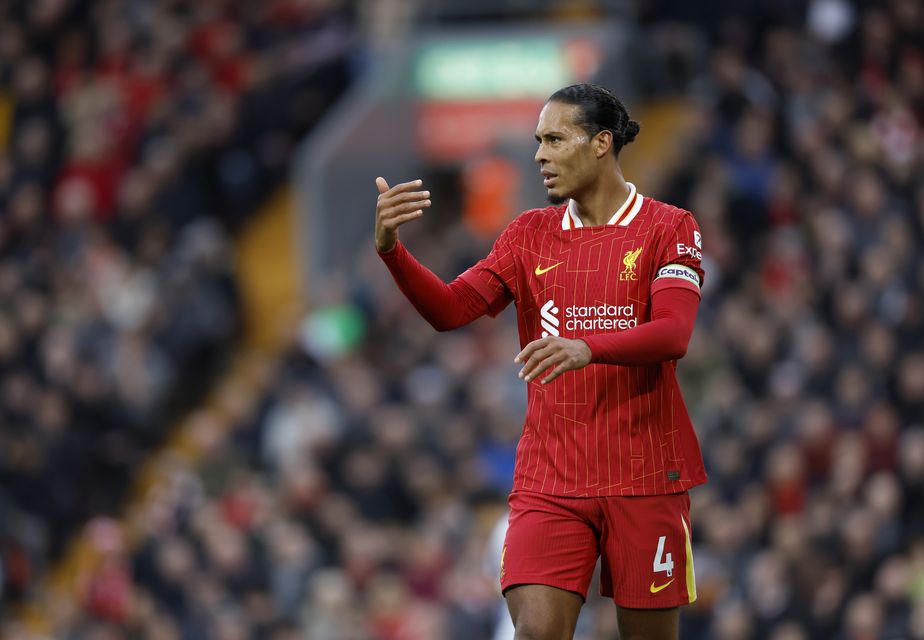 Virgil van Dijk, alongside Salah and Trent Alexander-Arnold, is also out of contract this summer (Nigel French/PA)