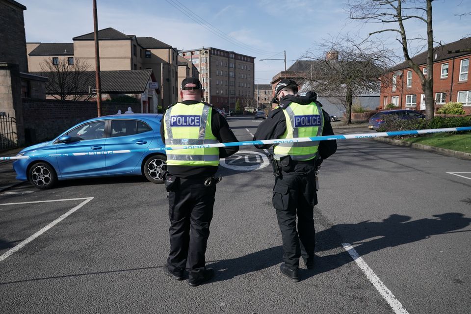 A visible police presence is being maintained in the area (Jane Barlow/PA)