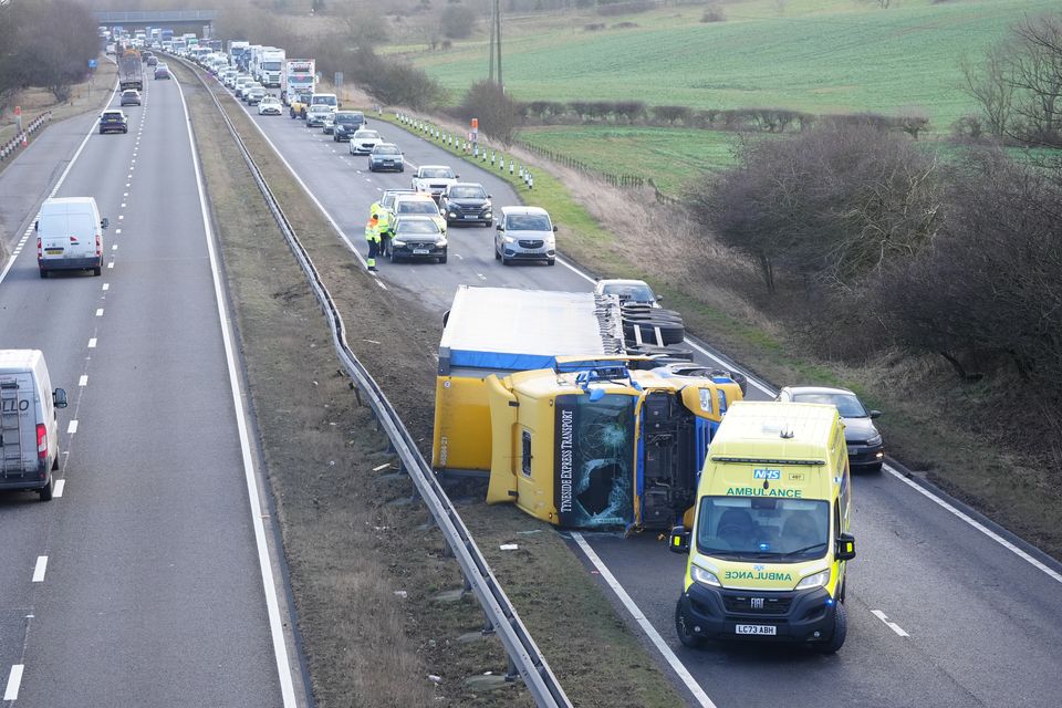 Motorists faced disruption on Friday because of strong winds (Owen Humphreys/PA)