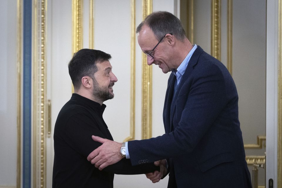 Ukrainian President Volodymyr Zelensky and the chairman of the German Christian Democratic Party Friedrich Merz during their meeting in Kyiv (Efrem Lukatsky/AP)