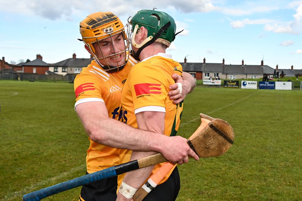 Antrim's Conor Boyd celebrates with team-mate Conal Cunning after their victory over Wexford