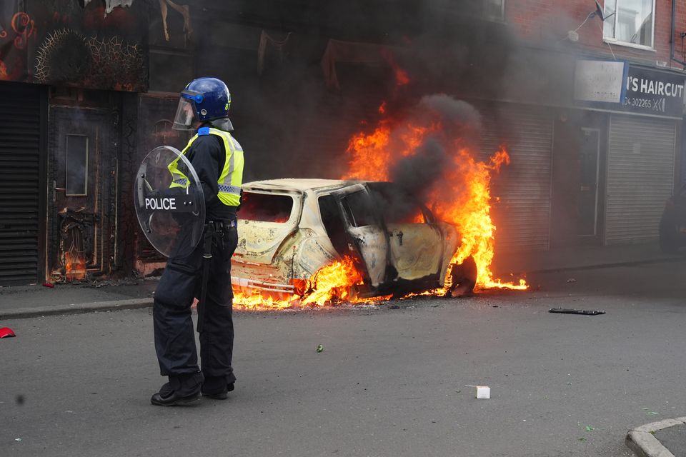 A car burns in Parliament Road in Middlesbrough (Owen Humphreys/PA)