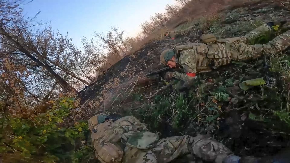 Russian soldiers target Ukrainian armed forces in the Sudzhansky district of the Kursk region of Russia (Russian Defence Ministry Press Service/AP)