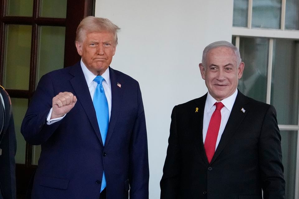 US President Donald Trump with Benjamin Netanyahu at the White House in February (Alex Brandon/AP)