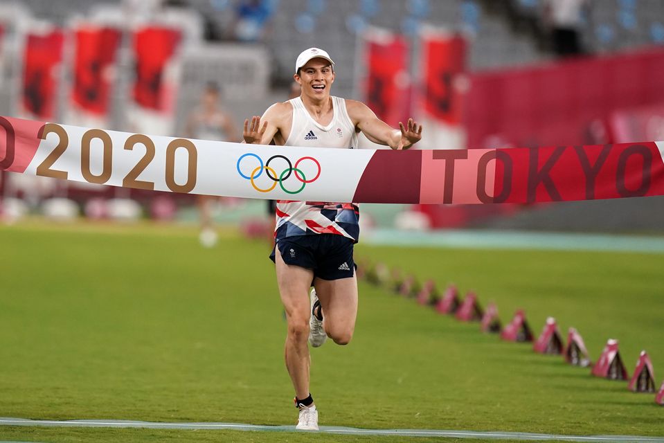 Choong crossing the finish line at the Tokyo Games (PA)