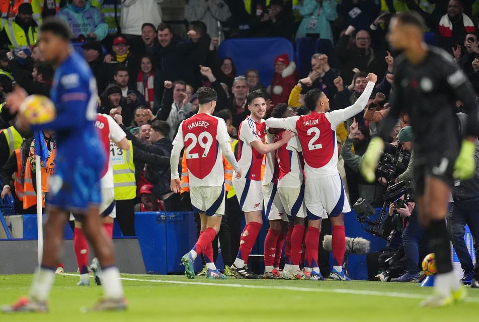 Arsenal players celebrate Martinelli’s opener (John Walton/PA)