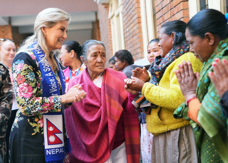 The Duchess of Edinburgh (left) with Anuradha Koirala (centre), founder of Maiti Nepal, during her visit to Maiti Nepal, in Kathmandu (Yui Mok/PA)