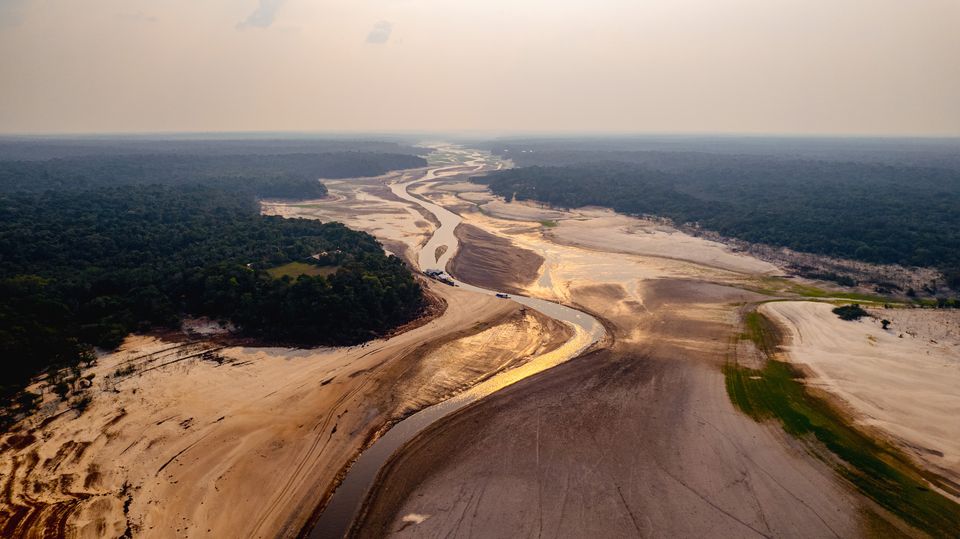 An aerial view of the Negro River, around the Manaus region in Brazil, one of the rivers that has suffered most from the drought that has spread across the Amazon (Jaqueline Lisboa/WWF-Brazil/PA)