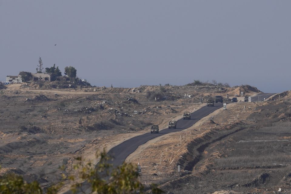 Israeli armoured vehicles near the Gaza Strip (Matias Delacroix/AP)