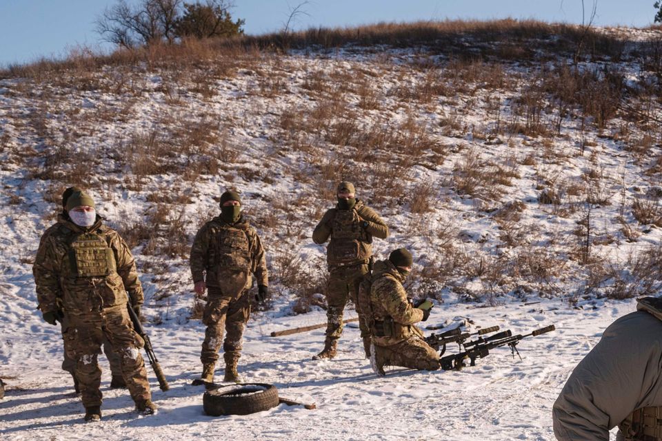 Serhii Pozniak,, a sniper unit commander with the 27th national guard brigade in Ukraine (Evgeniy Maloletka/AP)