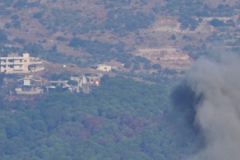 Smoke rises from an Israeli airstrike on the village of Khiam (Hussein Malla/AP)