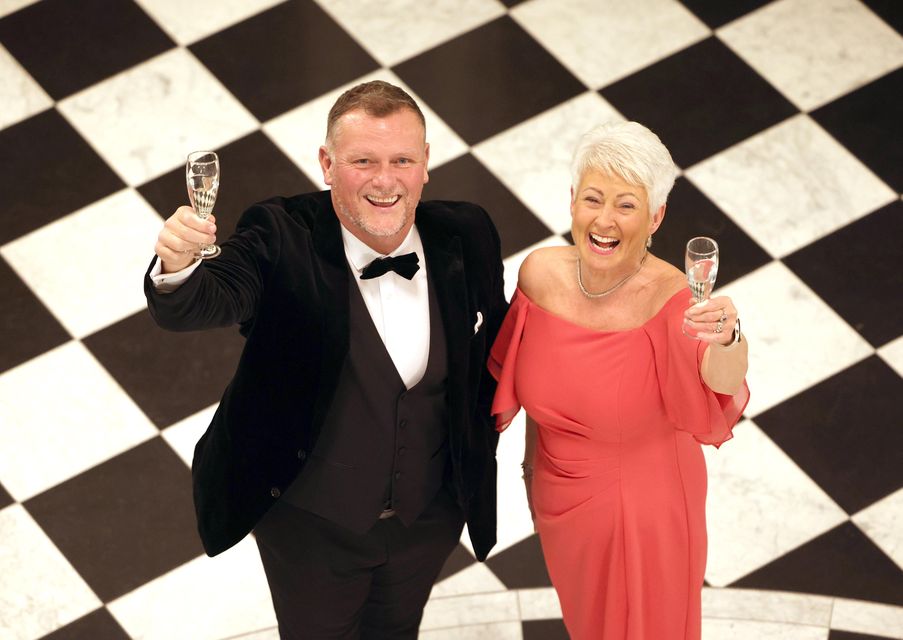 Cliftonville's Irish Cup-winning manager Jim Magilton is congratulated by Pamela Ballantine. Pic: Stephen Davison 