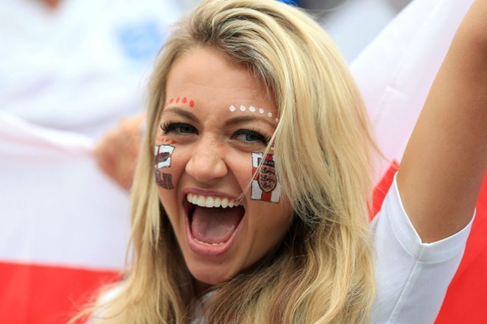 An England fan wearing face paint before the game during the Group D match in the Estadio do Sao Paulo, Brazil