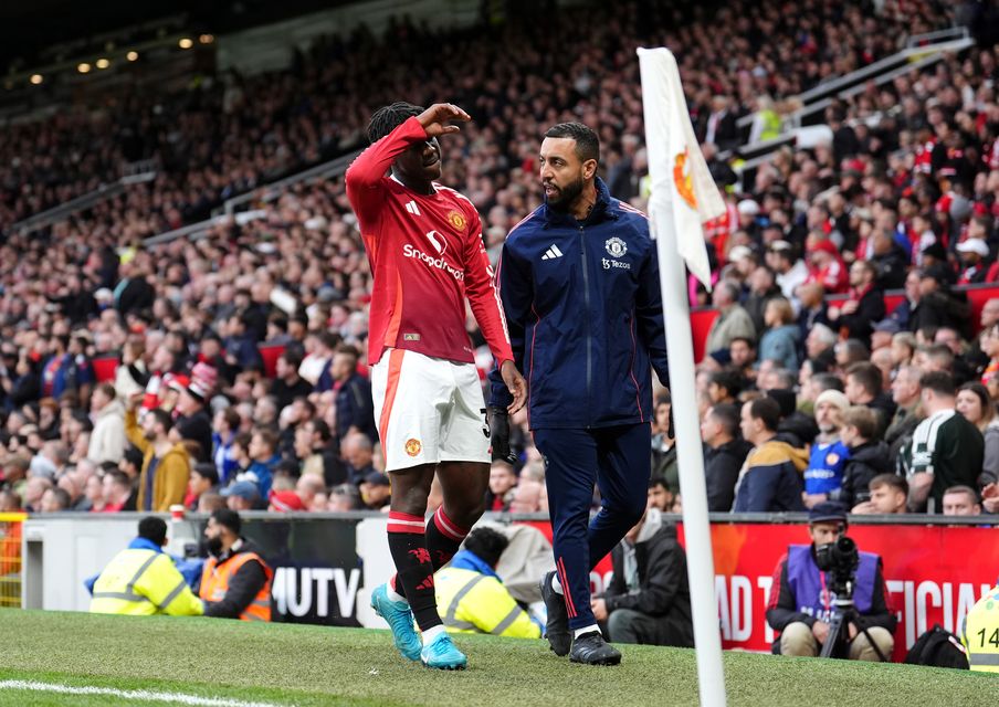 Kobbie Mainoo limped off against Tottenham on Sunday (Martin Rickett/PA)