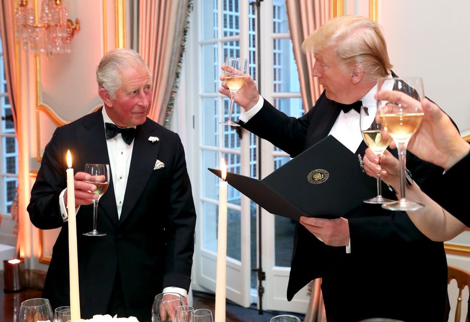 US President Donald Trump raises his glass to the then-Prince of Wales during the toast at the Return Dinner at Winfield House in 2019 (Chris Jackson/PA)