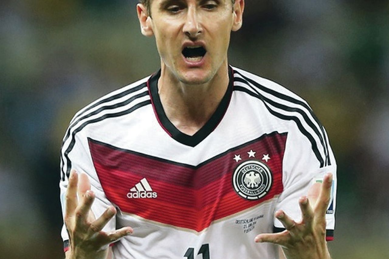 Klose double fires Germany to top spot