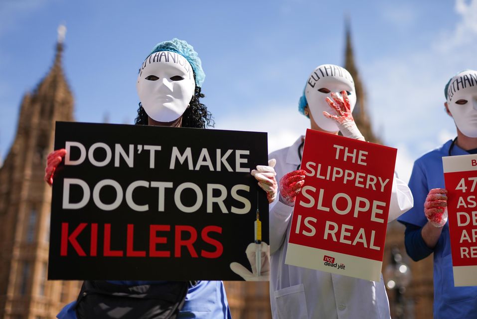 Campaigners protest outside Parliament ahead of a debate in the House of Commons on assisted dying (Jordan Pettitt/PA)