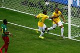 thumbnail: BRASILIA, BRAZIL - JUNE 23:  Fernandinho of Brazil (R) celebrates scoring his team's fourth goal with Ramires as Henri Bedimo of Cameroon looks on during the 2014 FIFA World Cup Brazil Group A match between Cameroon and Brazil at Estadio Nacional on June 23, 2014 in Brasilia, Brazil.  (Photo by Phil Walter/Getty Images)