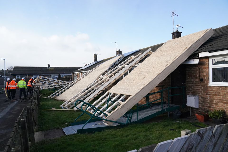 A roof blown off during strong winds damaged bungalows in Amble, Northumberland (Owen Humphreys/PA)