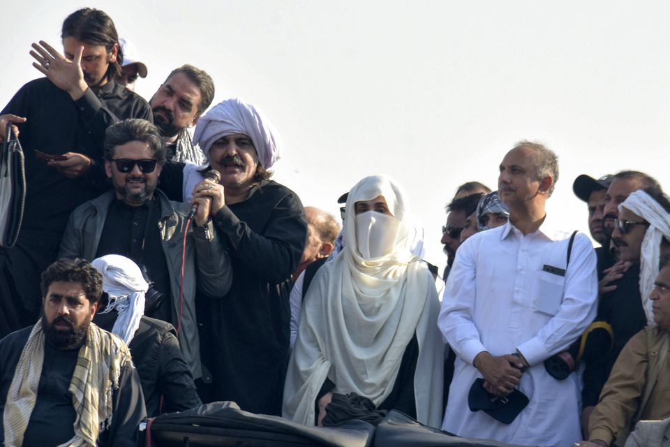 Bushra Bibi, wife of Imran Khan, with leaders of Khan’s party, during a rally demanding Khan’s release (W.K. Yousufzai/AP)