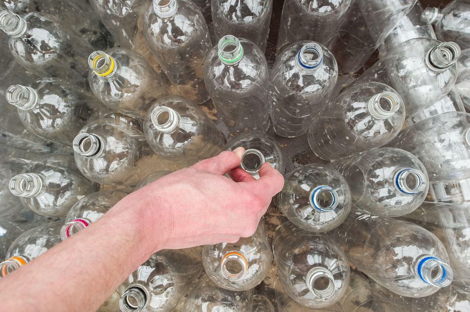 Each year, consumers in the UK go through an estimated 14 billion plastic drinks bottles and nine billion drinks cans (Jonathan Pow/PA)