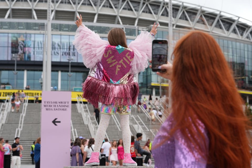 Fans have constructed their best outfits ahead of the show, with sparkles and glitter at every turn (Lucy North/PA)