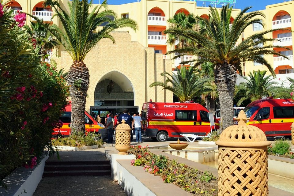 Emergency vehicles at the scene after the massacre in Sousse (AP)