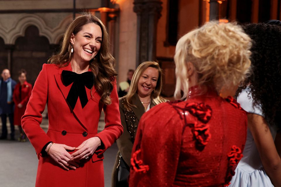 Kate met Paloma Faith during the Together At Christmas carol service, where she made a joke about everyone wearing red (Isabel Infantes/PA)