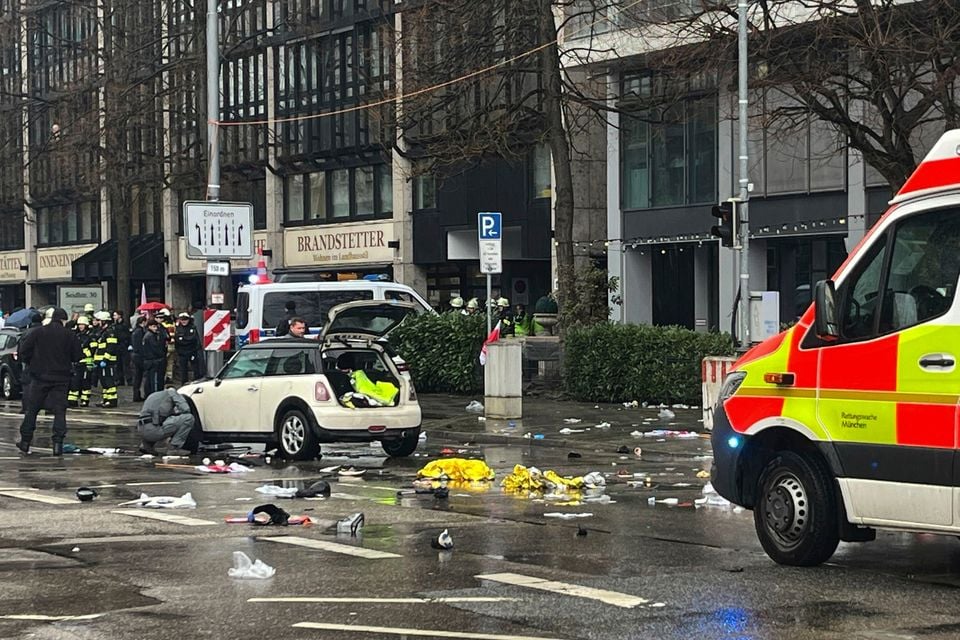 Emergency services attend the scene of an incident after a driver hit a group of people in Munich, Germany, on Thursday. Pic: Christoph Trost/dpa via AP