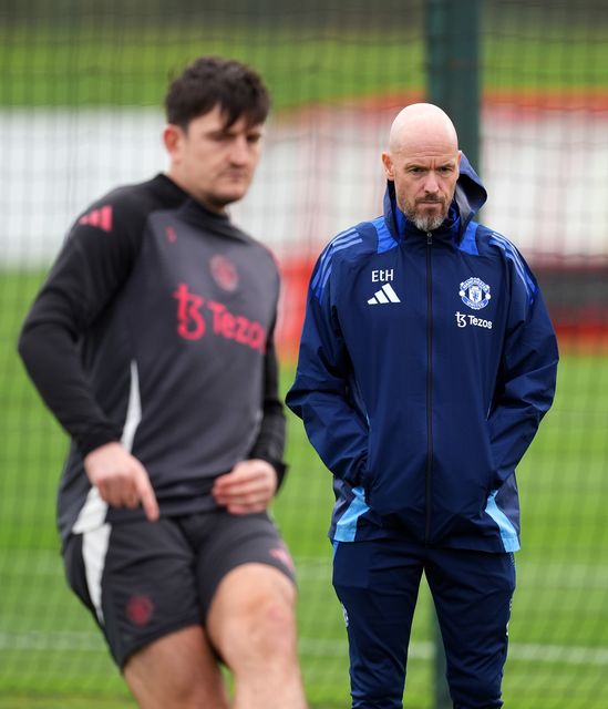 Harry Maguire, left, has backed manager Erik ten Hag despite Manchester United’s poor defensive record (Martin Rickett/PA)