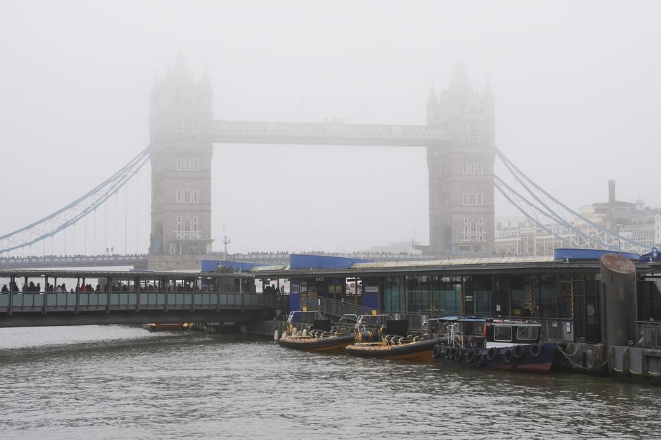 Tower Bridge was shrouded in mist on Friday (Lucy North/PA)