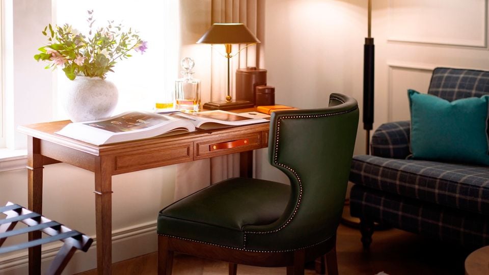 Interior of bedroom of Dunluce Lodge