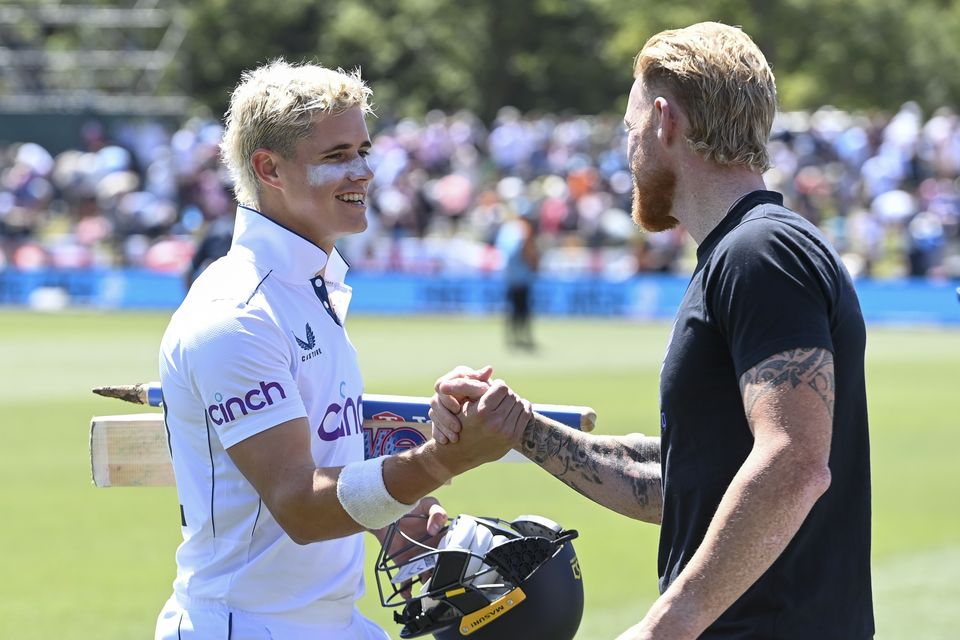 England’s Jacob Bethell, left, is congratulated by his captain Ben Stokes (John Davidson/Photosport/AP)