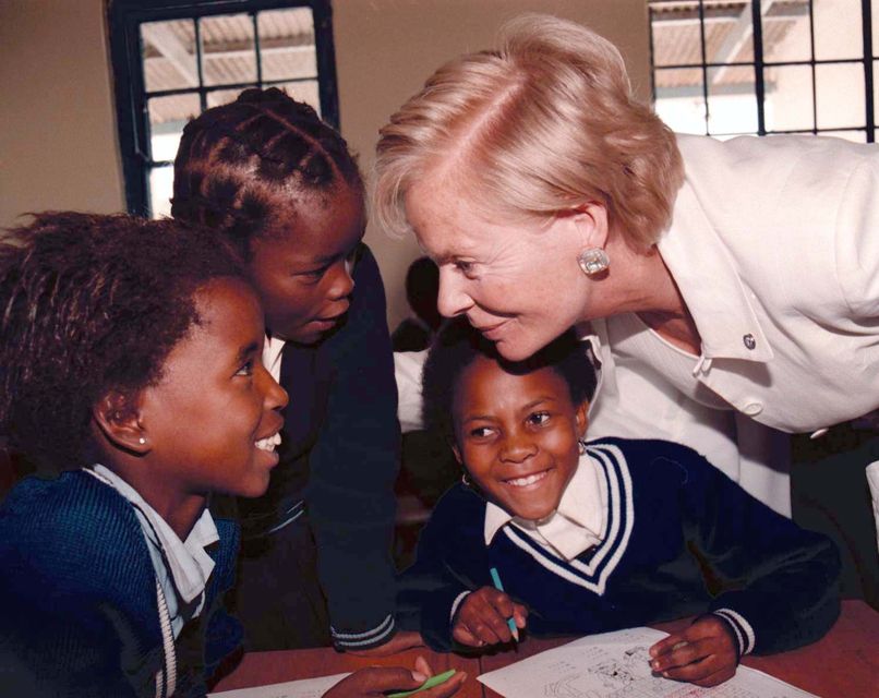 The Duchess of Kent meets pupils at Witkoppen School, near Pretoria in South Africa, in 1997 (Stefan Rousseau/PA)
