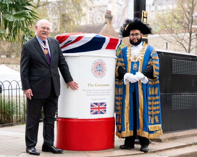 The post box in Westminster is unveiled by Kevin Traverse-Healy, Representative Deputy Lieutenant for Westminster (left) and the Right Worshipful The Lord Mayor of Westminster, Councillor Hamza Taouzzale