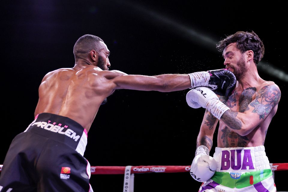 Mohamed Mimoune lands a blow on Tyrone McKenna during their fight at the SSE Arena