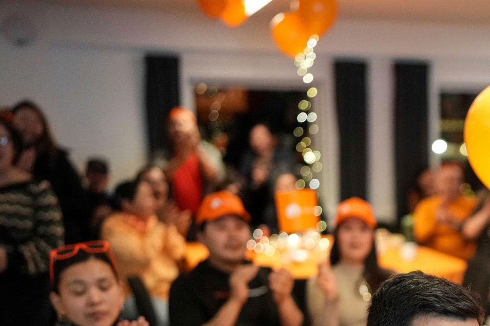 Members of the Naleraq party applaud during a party after parliamentary elections in Nuuk, Greenland (Evgeniy Maloletka/AP)