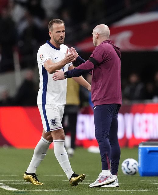 Lee Carsley, right, congratulates Harry Kane as he is substituted (Nick Potts/PA)