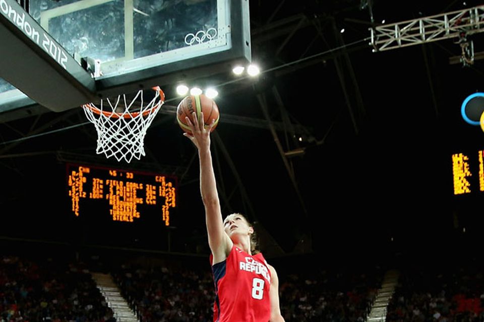 LONDON, ENGLAND - JULY 28: Ilona Burgrova #8 of Czech Republic shoots against Lijie Miao #8 of China during Women's Basketball on Day 1 of the London 2012 Olympic Games at the Basketball Arena on July 28, 2012 in London, England.  (Photo by Christian Petersen/Getty Images)