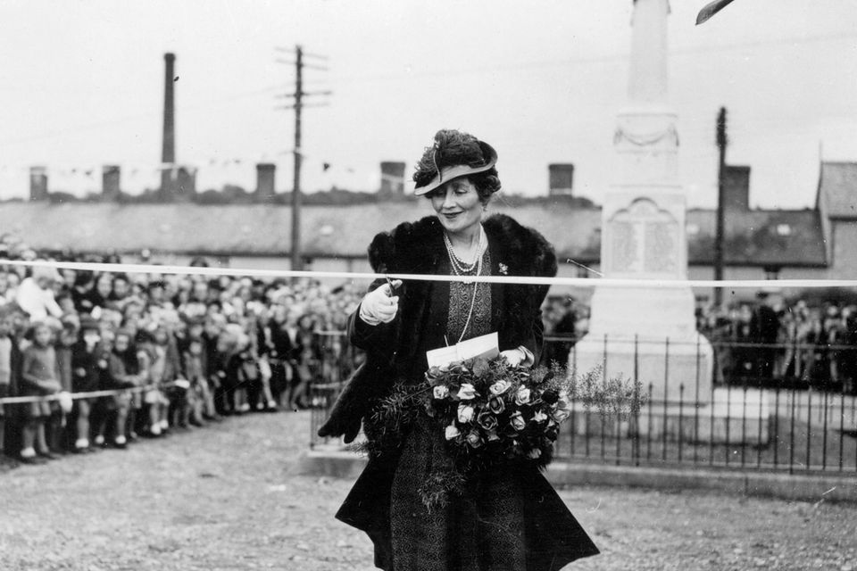 The Countess Granville, wife of the Ulster Governor and sister of Queen Elizabeth, the Queen Mother, cutting ribbon to open childrens play centre at Bessbrook.  15/9/1945