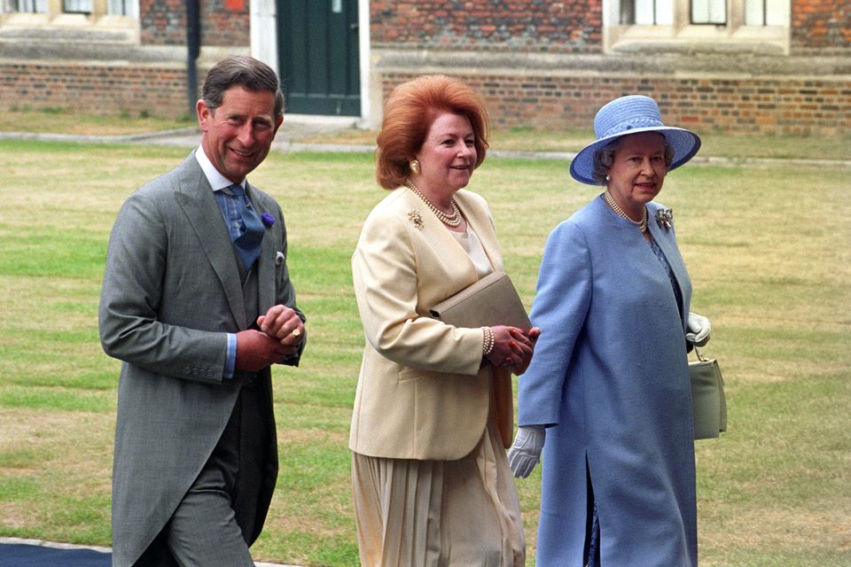 Lady Elizabeth Shakerley, who has died aged 79, seen walking with the Queen and the Prince of Wales at a wedding reception in Hampton Court Palace (Sean Dempsey/PA)