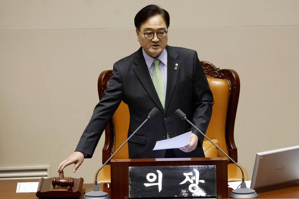 South Korean National Assembly Speaker Woo Won Shik urged ruling party members to vote (AP)