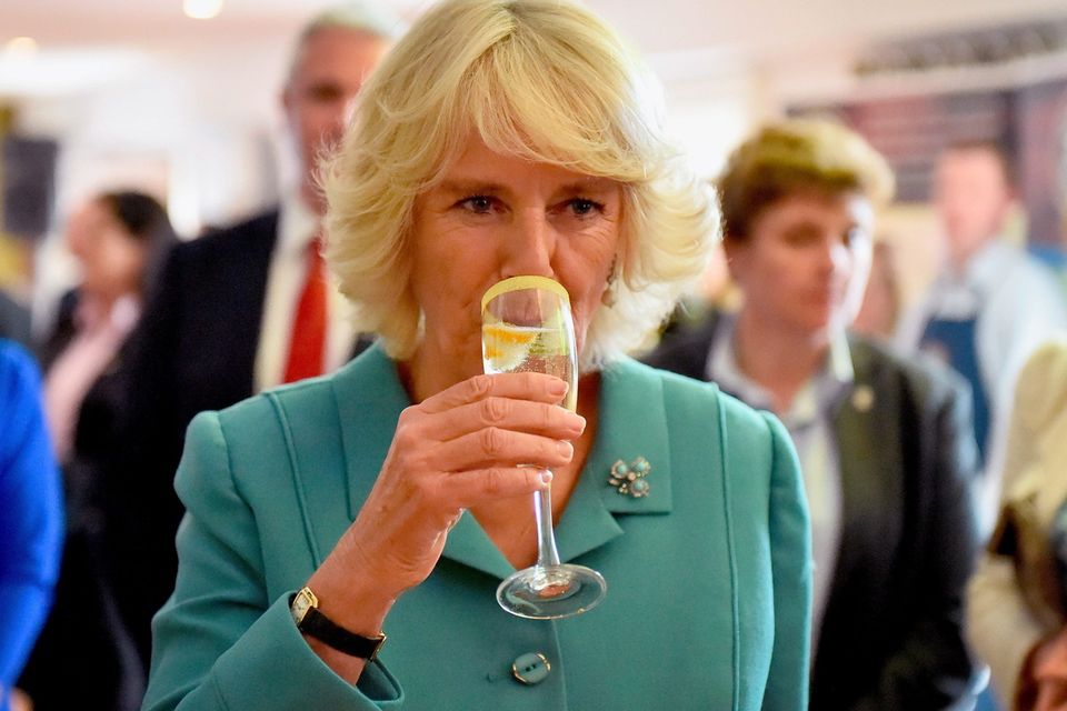 Britain's Camilla, Duchess of Cornwall samples a cocktail, called "The Duchess" as she visits the Taste of the Wild Atlantic Way Food Festival at the House Hotel in Galway, west Ireland on May 19, 2015. Prince Charles became the first British royal to meet Irish republican leader Gerry Adams, on a visit that will take him to the scene of his great-uncle's murder by the IRA.  AFP PHOTO / POOL / JEFF J MITCHELLJEFF J MITCHELL/AFP/Getty Images