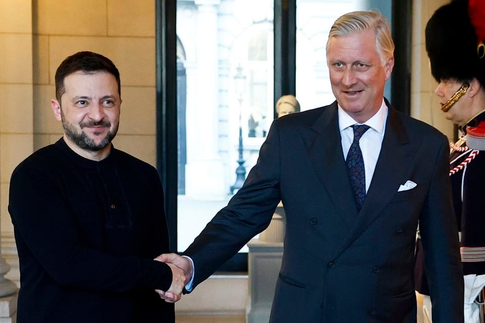 Belgium’s King Philippe, right, greets Ukraine’s President Volodymyr Zelensky before a meeting at the Royal Palace in Brussels (Stephanie Lecocq/Pool Photo/AP)