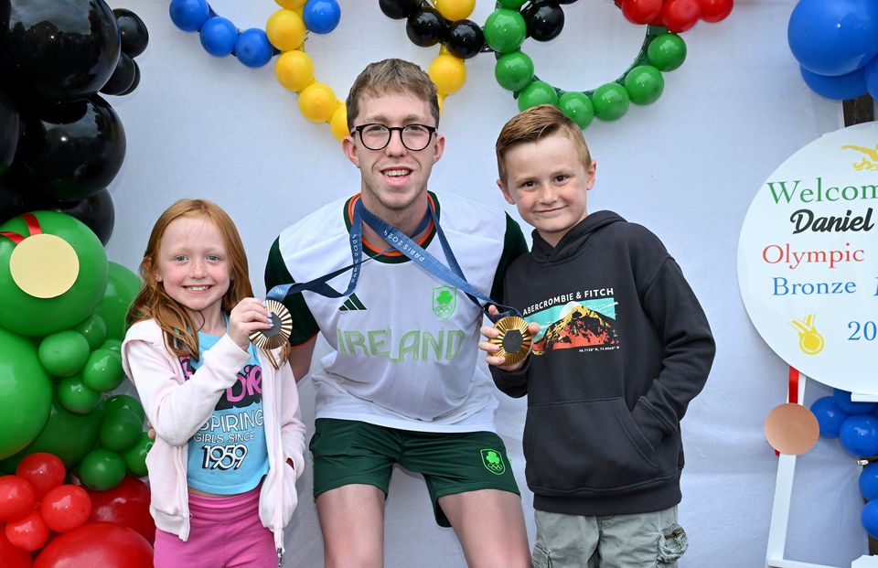 Daniel pictured with twins Connor and Sofia Quail. (Pic: Stephen Hamilton)