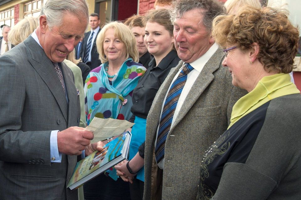 Britain's Prince Charles, Prince of Wales (L) reads a letter from his great-uncle Lord Mountbatten shown to him by Daithi O'Dowd during a visit to the village of Mullaghmore in Ireland on May 20, 2015 where Lord Mountbatten was killed in an Ire bombing in 1979. Britain's Prince Charles spoke of his "anguish" at the murder of his godfather by IRA paramilitaries in 1979 as he became the first royal to visit the assassination site in Ireland.  Charles remembered Lord Louis Mountbatten as "the grandfather I never had" on an emotional trip to the rugged coastline, saying he understood the suffering of the Irish people in "a profound way".  Peter McHugh helped with the rescue effort in the aftermath of the 1979 attack.  AFP PHOTO / POOL / ARTHUR EDWARDSARTHUR EDWARDS/AFP/Getty Images