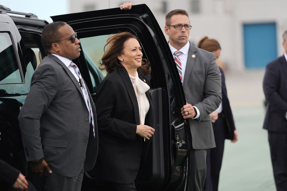 Democratic presidential nominee vice president Kamala Harris, centre, arrives to board Air Force Two at San Francisco International Airport (Julia Nikhinson/AP)